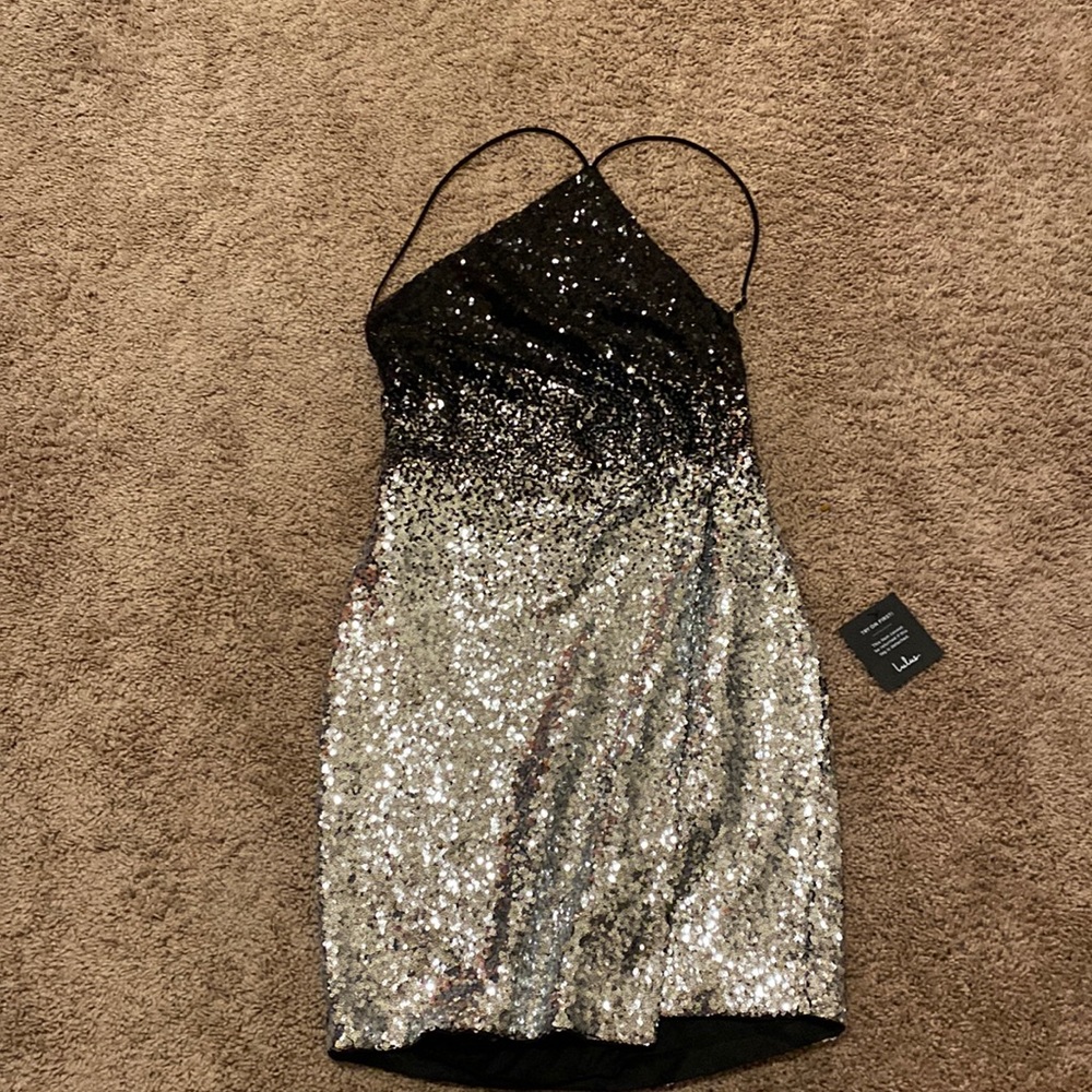 Beautiful sequence cocktail dress. NWT